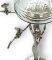 Metal Lady Absinthe Fountain - detail of glass bowl, metal taps and stand.