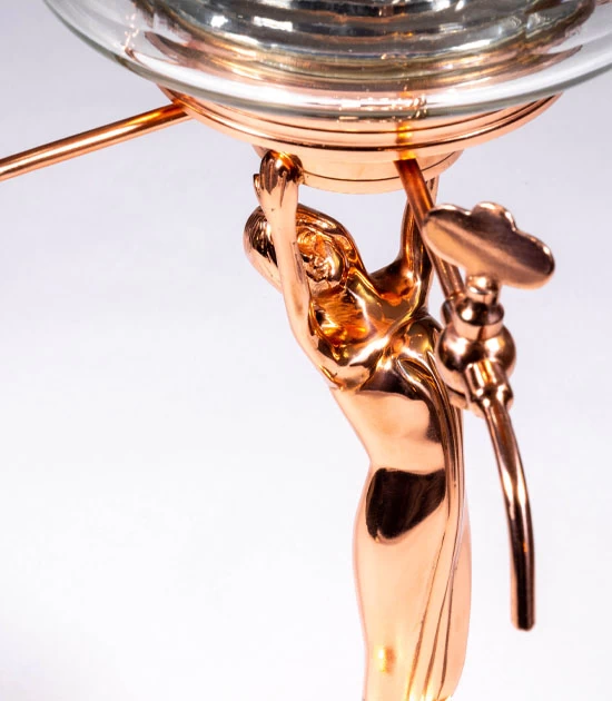 An exact reproduction of copper-plated metal absinthe fountain in a lovely rose-gold color.